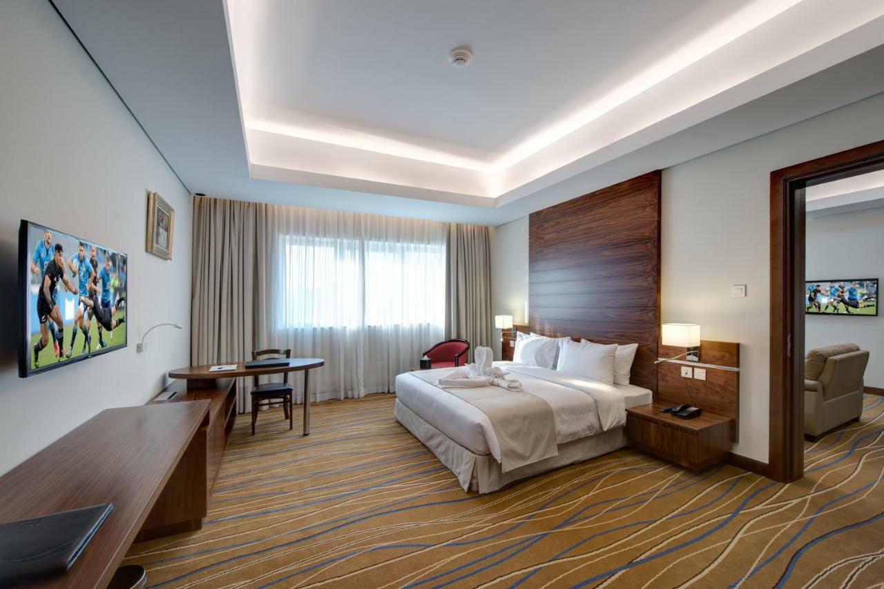 Center Hotel Charjah Extérieur photo