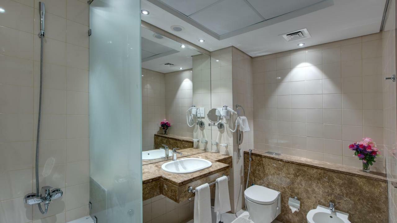 Center Hotel Charjah Extérieur photo
