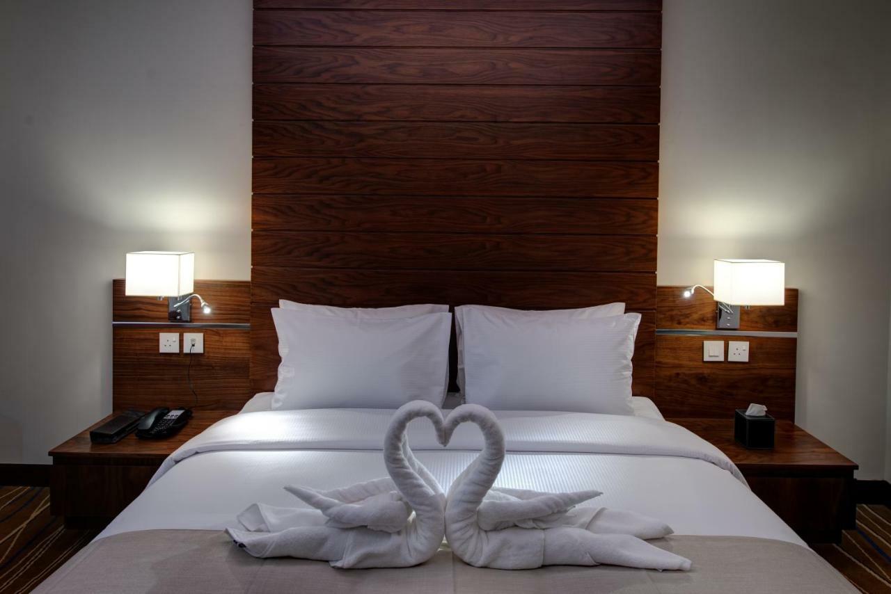 Center Hotel Charjah Extérieur photo