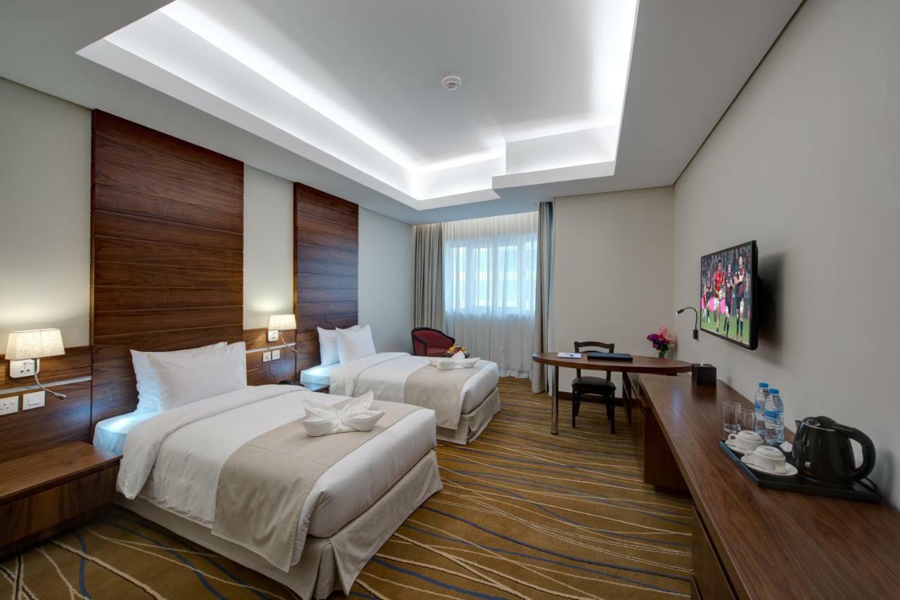 Center Hotel Charjah Extérieur photo